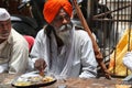 Pune, India - Ã¢â¬Å½July 11, Ã¢â¬Å½2015: A hindu pilgrim having a meal